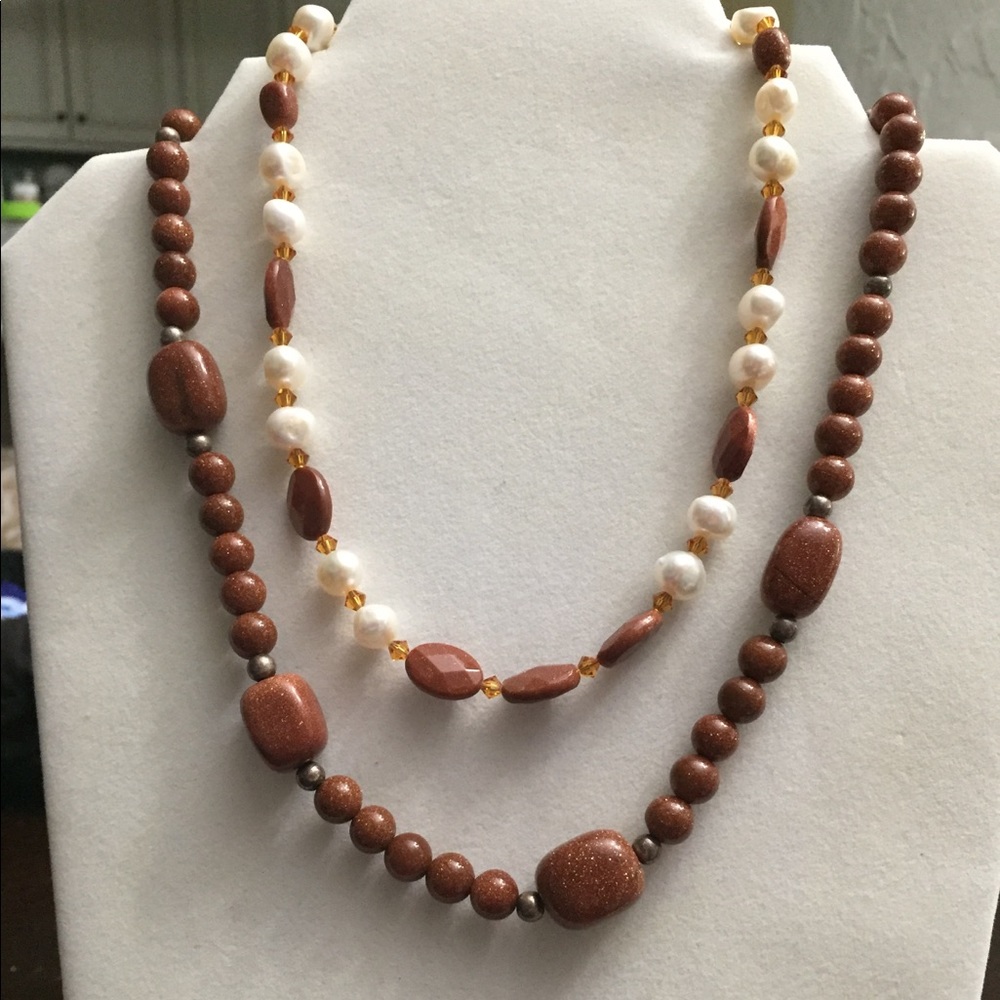 Two lovely goldstone necklaces - one with pearls